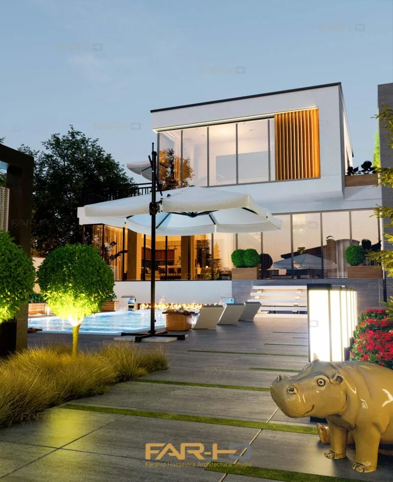 Kordan Villa at dusk with a glowing upper living volume, outdoor lounge, reflecting pool and layered garden planting.